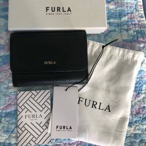 Very good used condition small trifold Furla wallet
